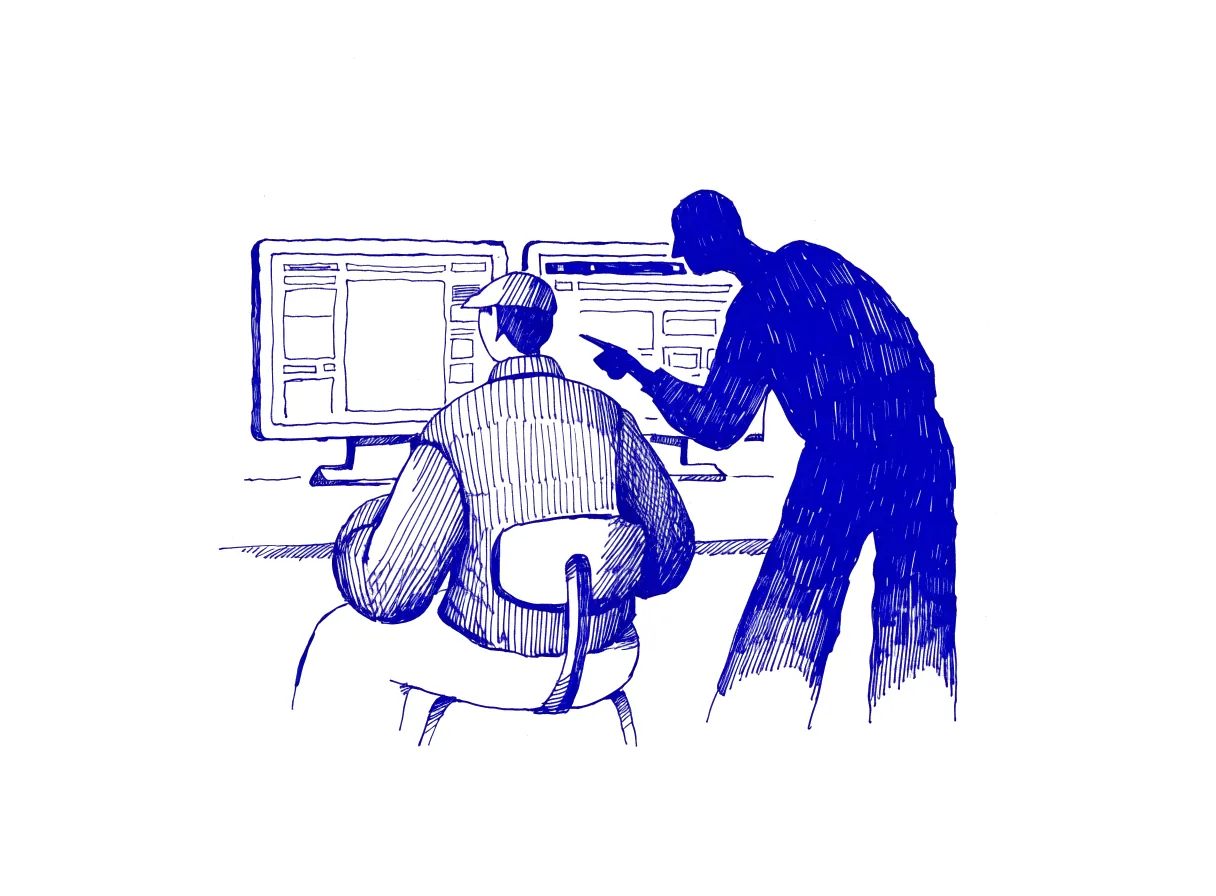 A front-end engineer seen from behind at two monitors, one showing a design file and the other a running web page, with a colleague in silhouette leaning in to point at a gap, the whole scene drawn with wide empty margins on every side.