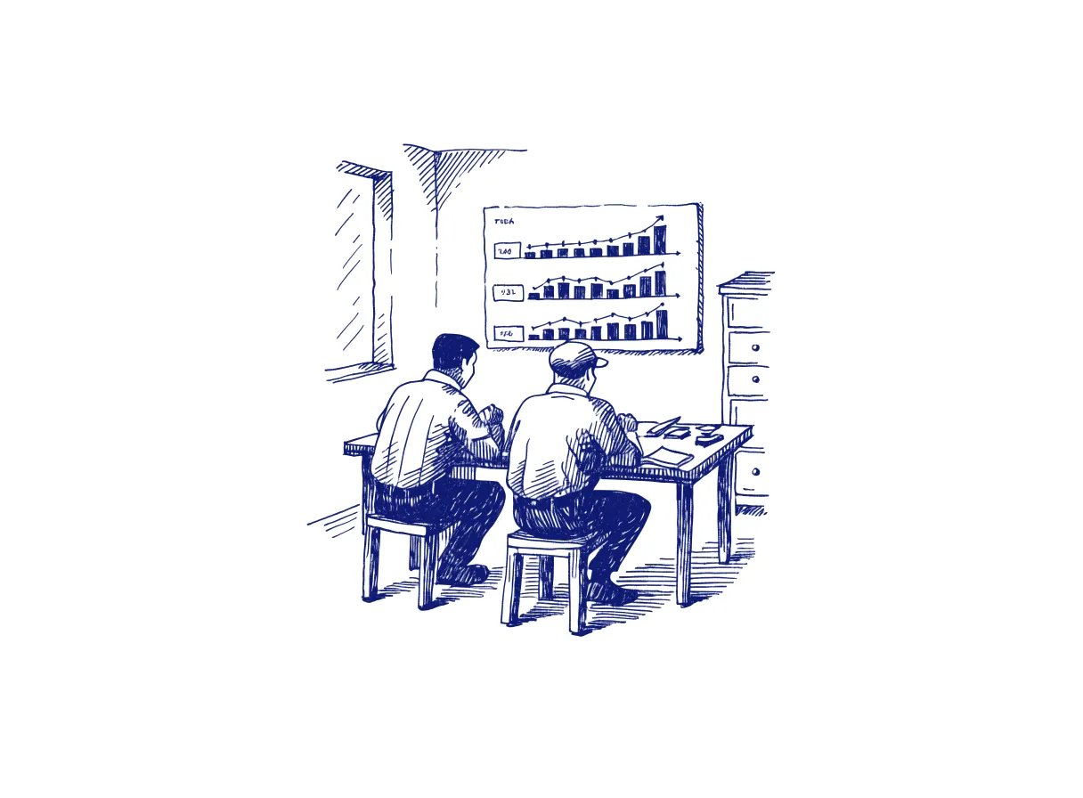 Two engineers seen from behind at a shared table in a small office, watching a wall chart where the bar for safety checks grows taller each month, the whole scene drawn with wide empty margins on every side.